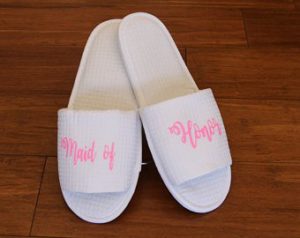 a pair of white slippers